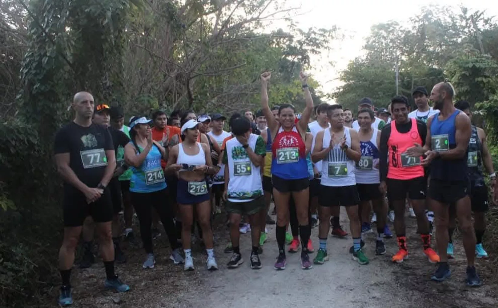 Participants running in the Disfrutemos la Jungla III charity race in Playa del Carmen