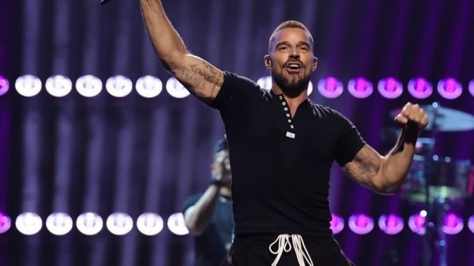 Ricky Martin performing during his concert tour