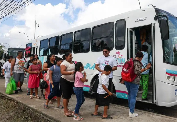 A Ruta al Mar bus transporting citizens to Cancún beaches