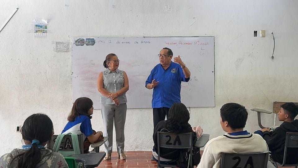 Municipal authorities greeting students at a school in Tulum