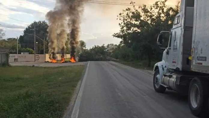 Scene from Felipe Carrillo Puerto showing effects of recent violence and blockades