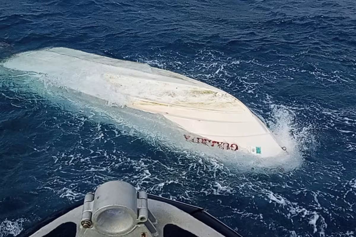 A fishing boat capsized and adrift in the sea near Isla Mujeres