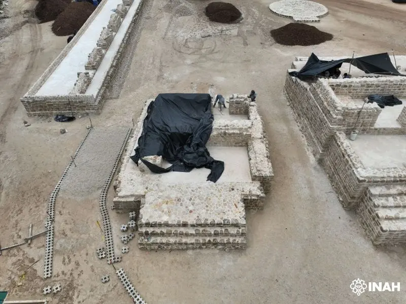 Photograph showing the exterior facade of a structure at Báalam Tun Park alongside exposed modern fill material