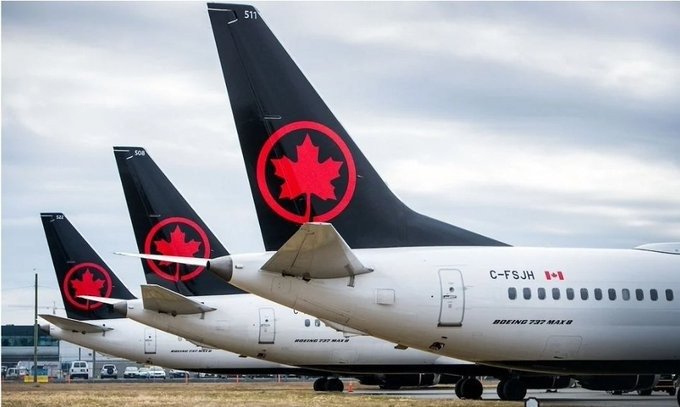Passengers at Cancún International Airport terminal