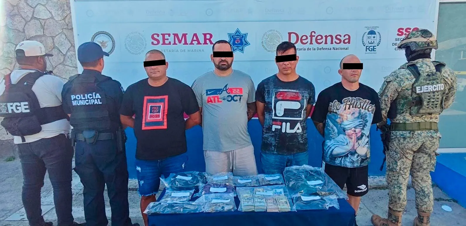 Evidence seized during a drug bust in Cancún, including cash and suspected narcotics