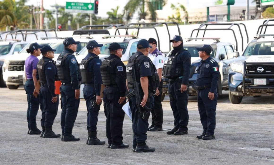 Cancún police officers on patrol, with body cameras visible on their uniforms