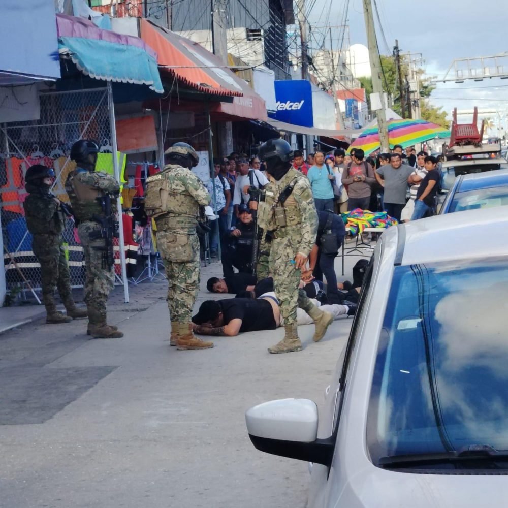 Police officers responding to an incident on Jose Lopez Portillo Avenue in Cancun