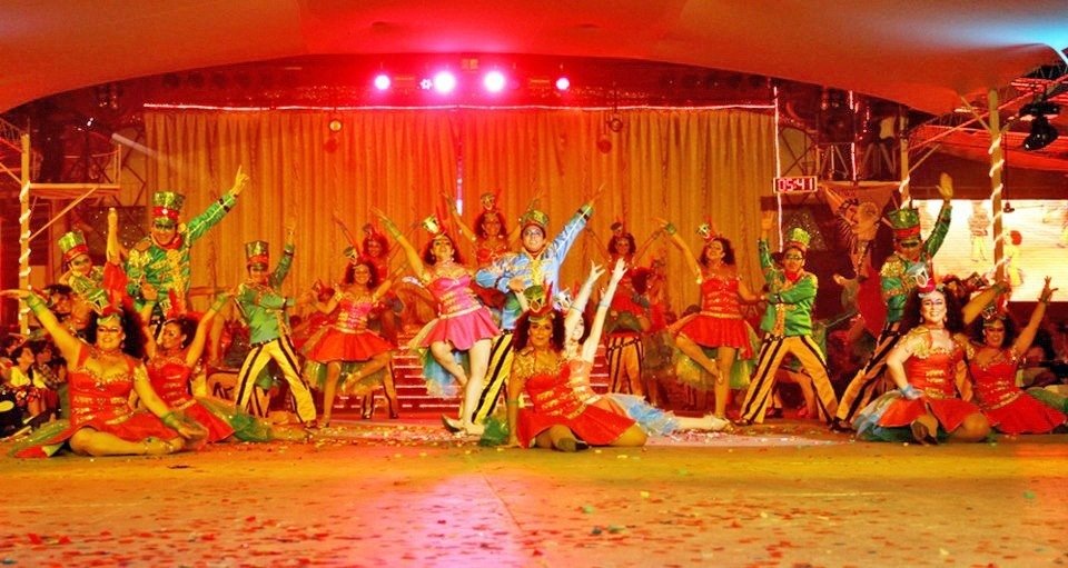 A promotional image for the Cozumel Carnival panel discussion at the Museum of the Island auditorium.