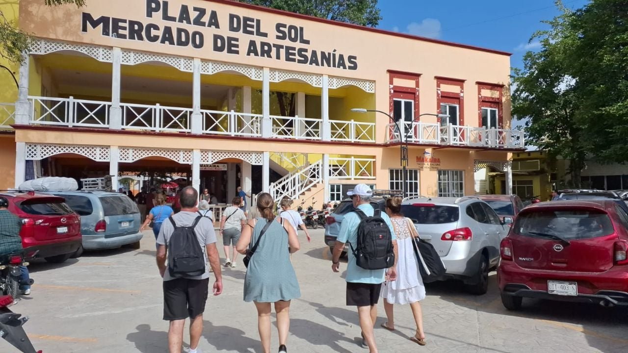 Tour buses parked at new designated spaces in Plaza del Sol parking lot in Cozumel
