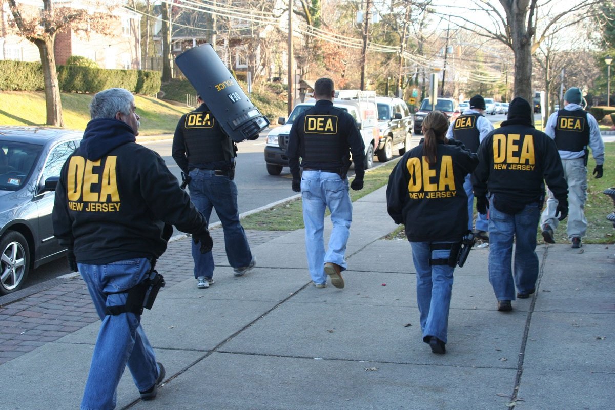 DEA agents conducting a drug seizure operation in 2025