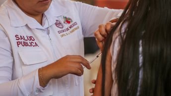 Health workers conducting epidemiological controls in Mexico City during the measles outbreak