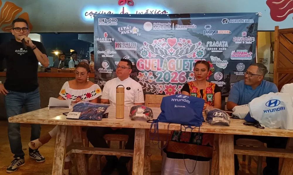 Performers in traditional Oaxacan dress at a Guelaguetza festival event