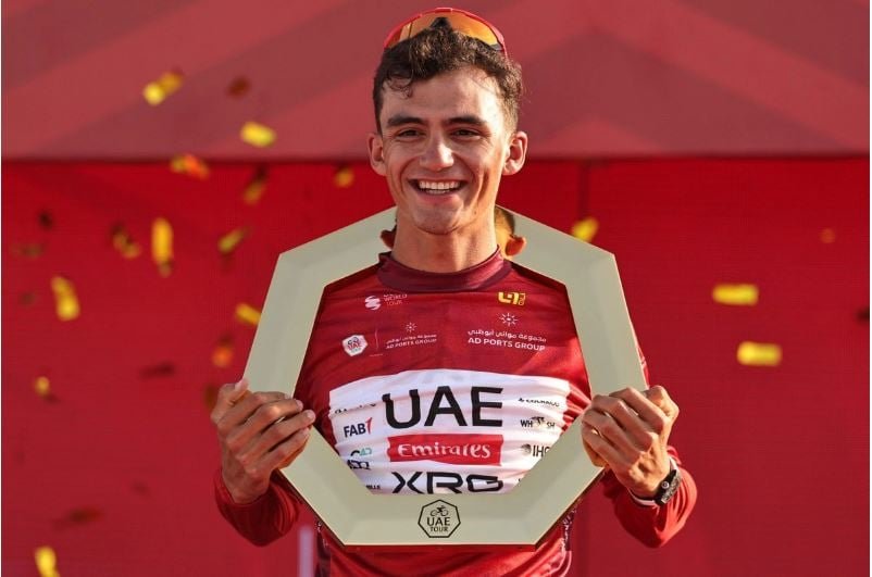 Mexican cyclist Isaac Del Toro celebrating his UAE Tour win in Abu Dhabi