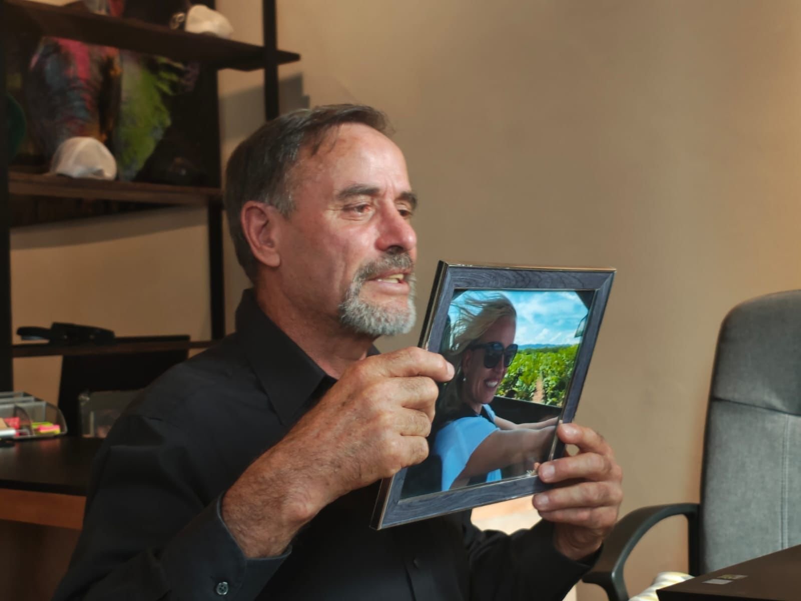 Members of the LeBaron family holding signs demanding justice for the 2019 massacre in Bavispe