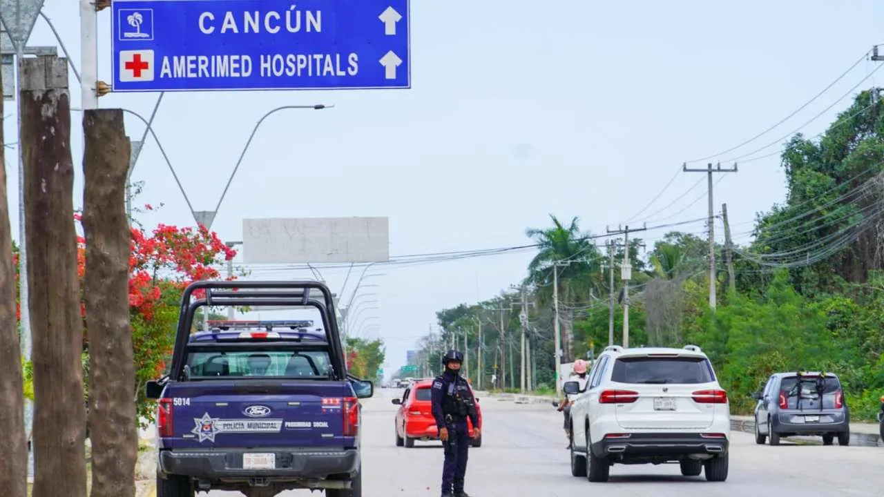 Aerial view of a beach resort in the Mexican Caribbean with tourists and clear blue water