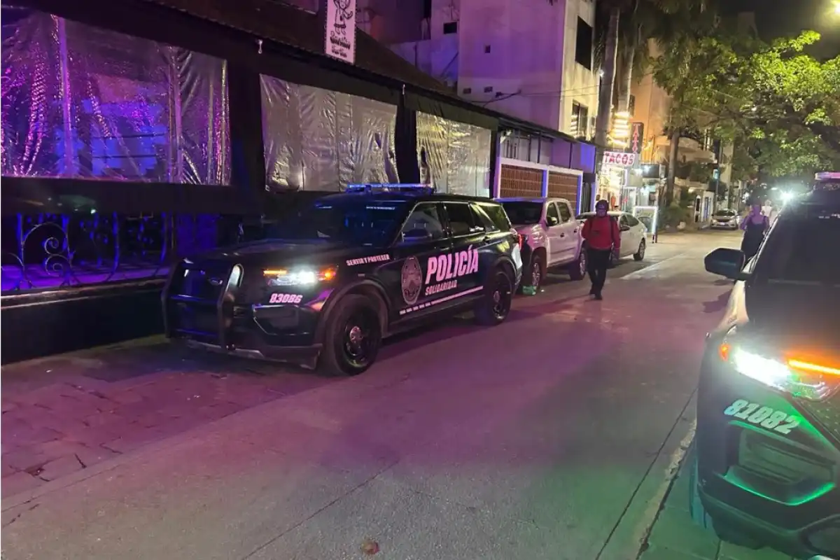 Emergency personnel respond to an incident outside a bar in Playa del Carmen