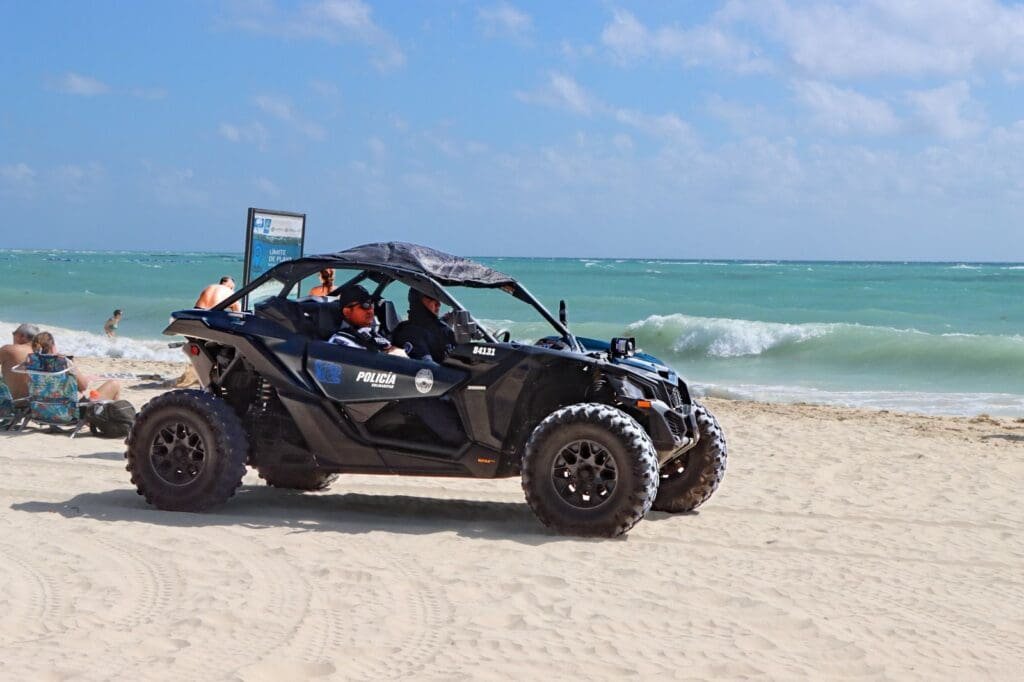 Police officers patrolling a beach in Playa del Carmen, Quintana Roo