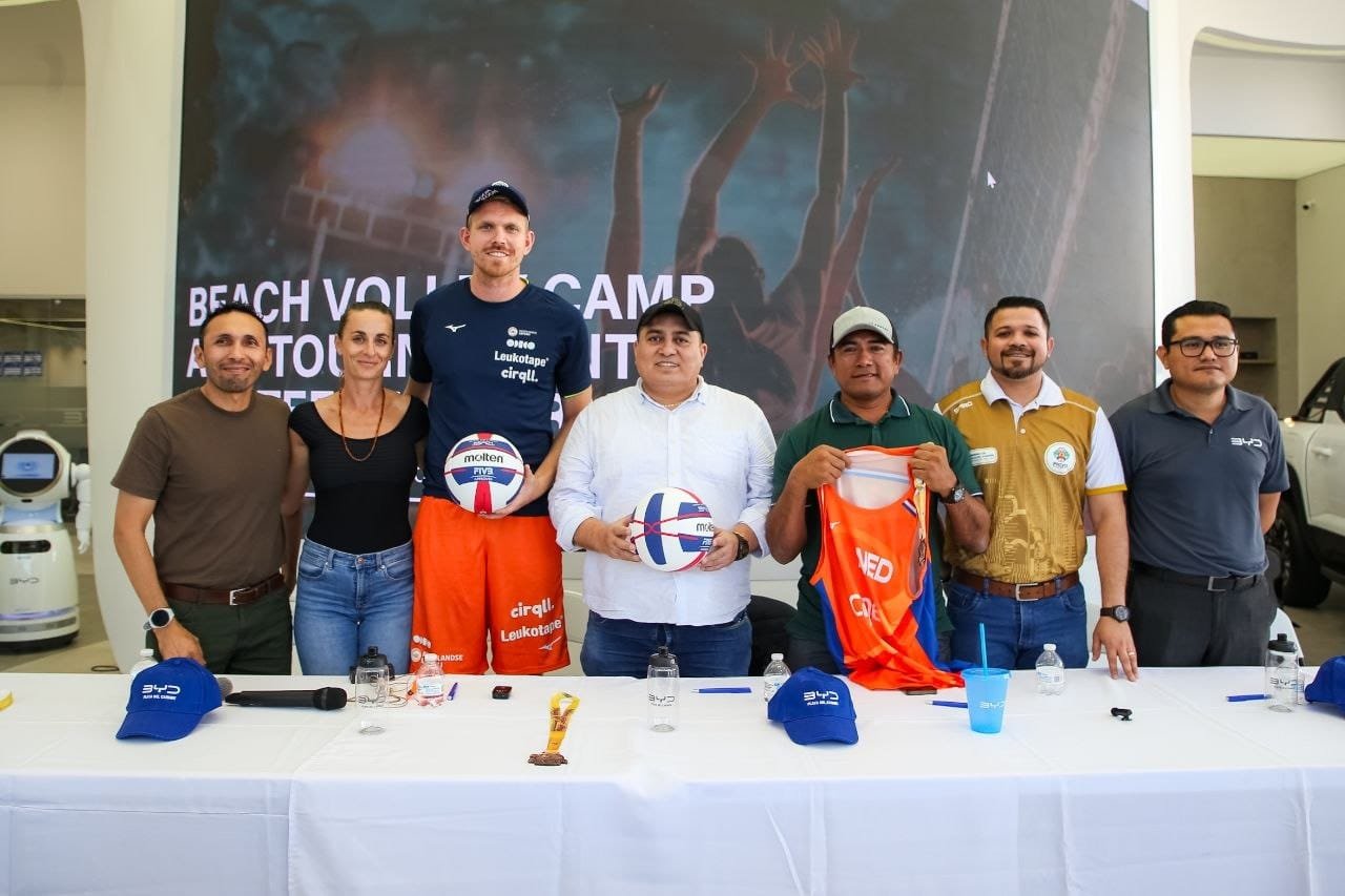 Officials and organizers at a press conference announcing the beach volleyball camp and tournament in Playa del Carmen
