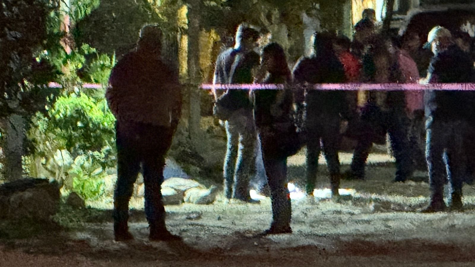 Police and forensic personnel at the scene of a fatal shooting in Playa del Carmen