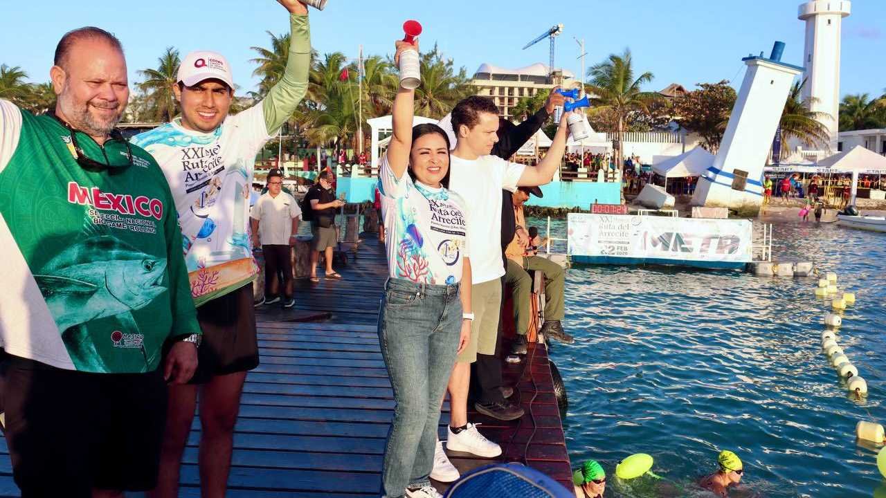 Mayor Blanca Merari Tziu leads the opening ceremony for the 21st Open Water Marathon in Puerto Morelos, Quintana Roo.