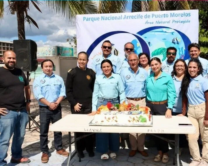 Officials and community members gather at the Ventana al Mar in Puerto Morelos to celebrate the 28th anniversary of the Puerto Morelos Reef National Park
