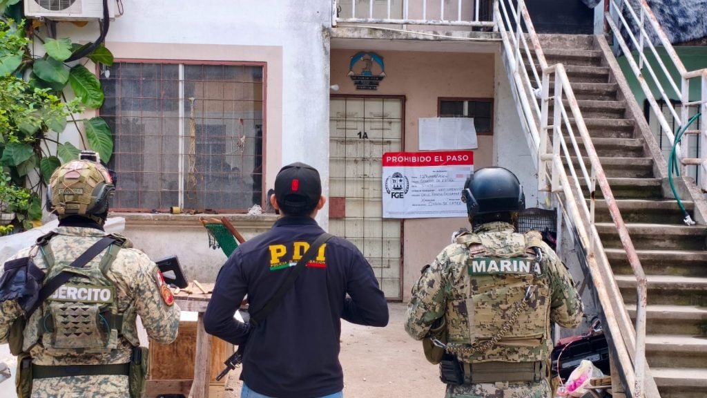 Police officers conducting a raid in Quintana Roo, Mexico