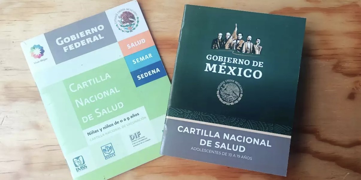 A teacher reviewing vaccination records in a classroom setting