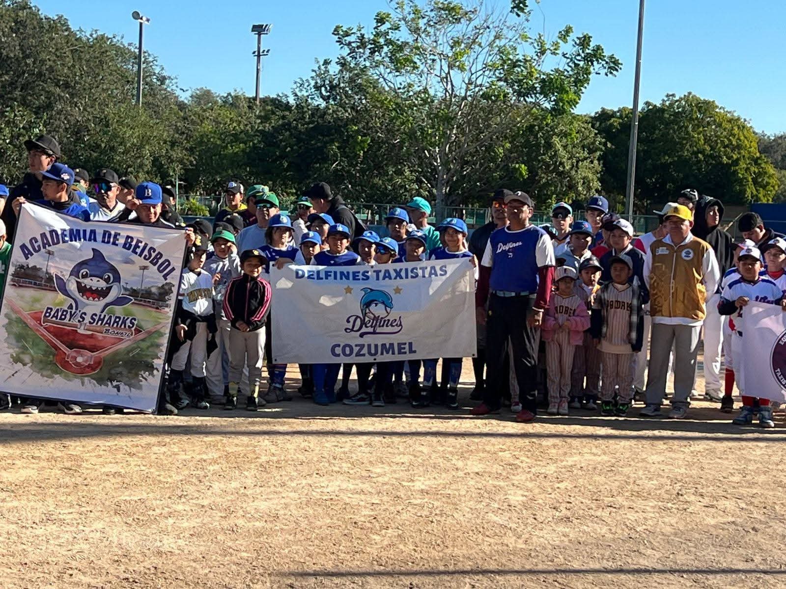 Youth baseball players and officials gather for the inauguration of the Riviera Maya league in Cancun