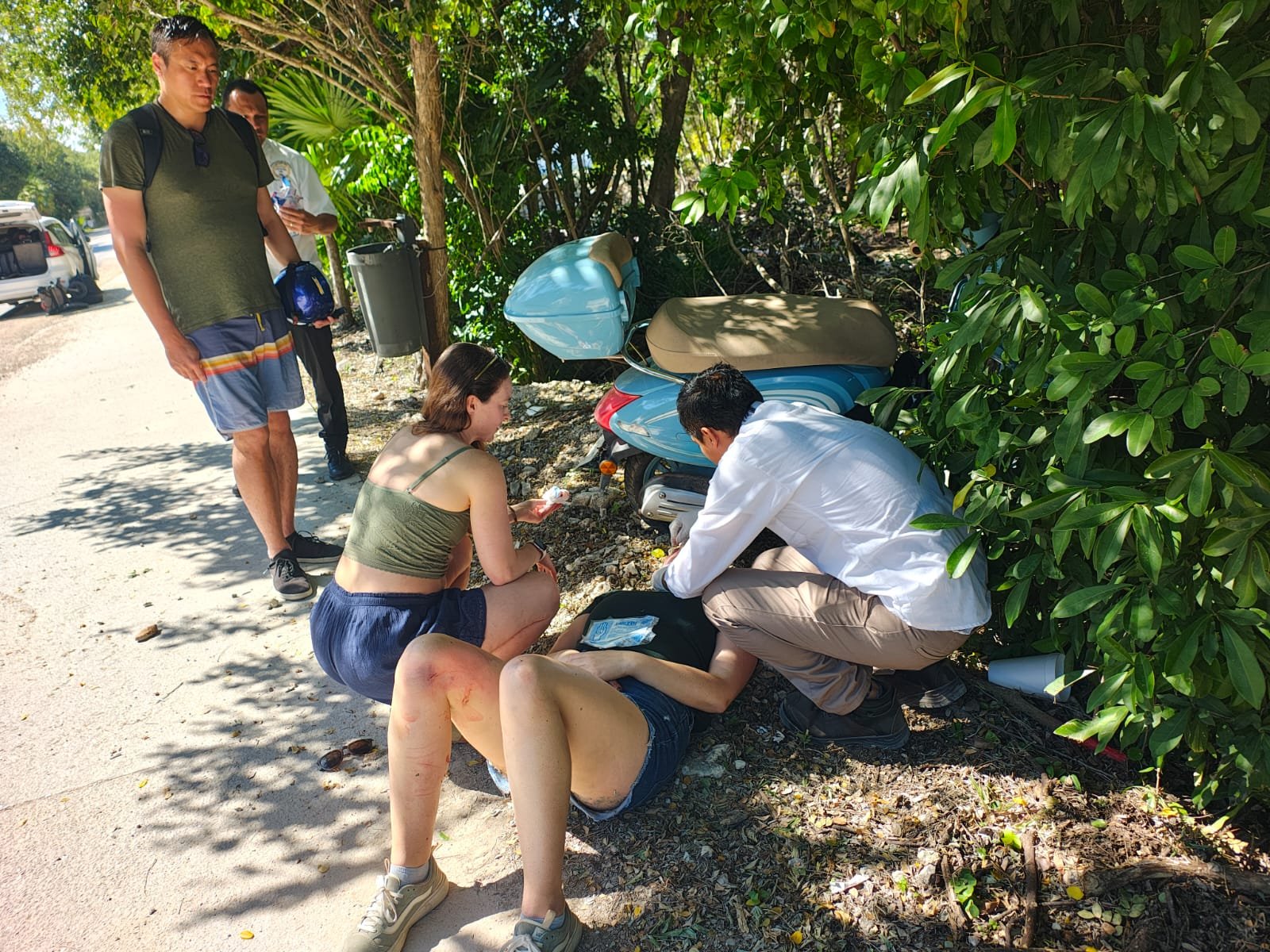 Emergency responders at the scene of a motorcycle accident on Kukulcán Avenue in Tulum