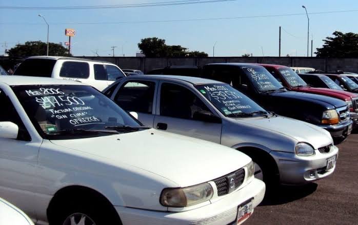 A graphic or photo illustrating vehicle sale fraud warnings in Quintana Roo, Mexico