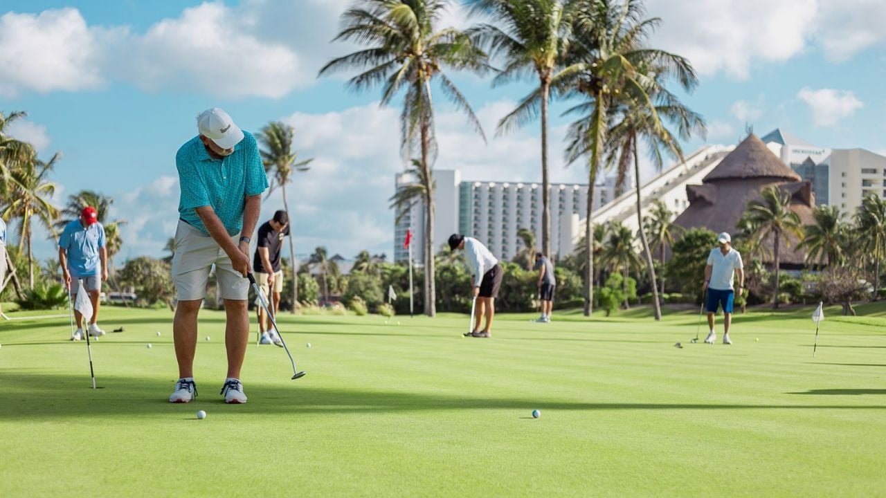 Golfers competing in an amateur tournament at a golf course in Cancun, Quintana Roo