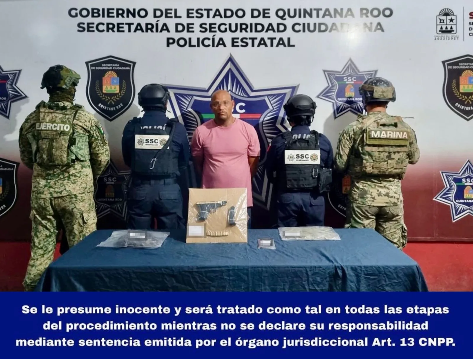 Police evidence from a drug and gun arrest in Cancún, Mexico