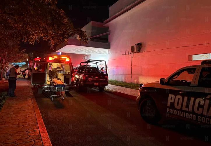Police and forensic personnel at the scene of a shooting at Fushion Sport Bar in Cancun