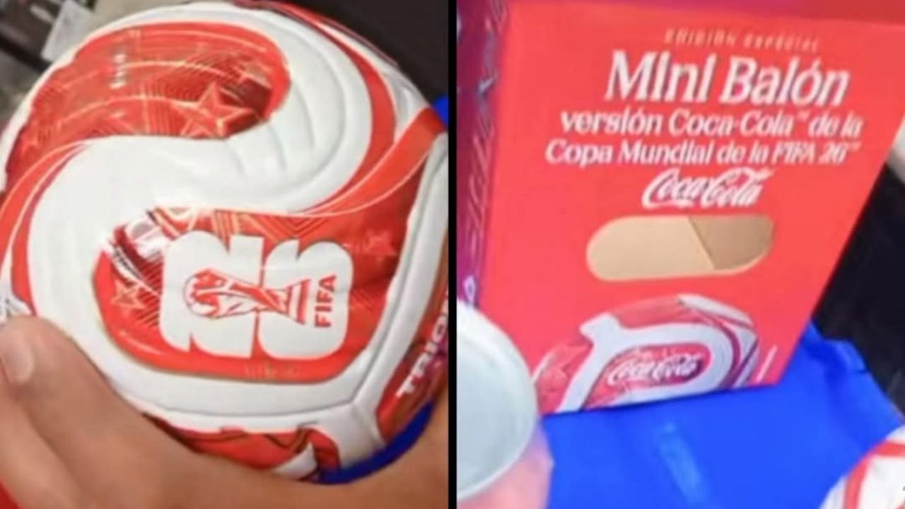 A promotional display showing the Coca-Cola World Cup 2026 ball and cans at an Oxxo store