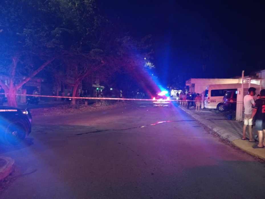 A vehicle with multiple bullet holes parked outside a house in Playa del Carmen's Palmas 2 neighborhood after a shooting attack.