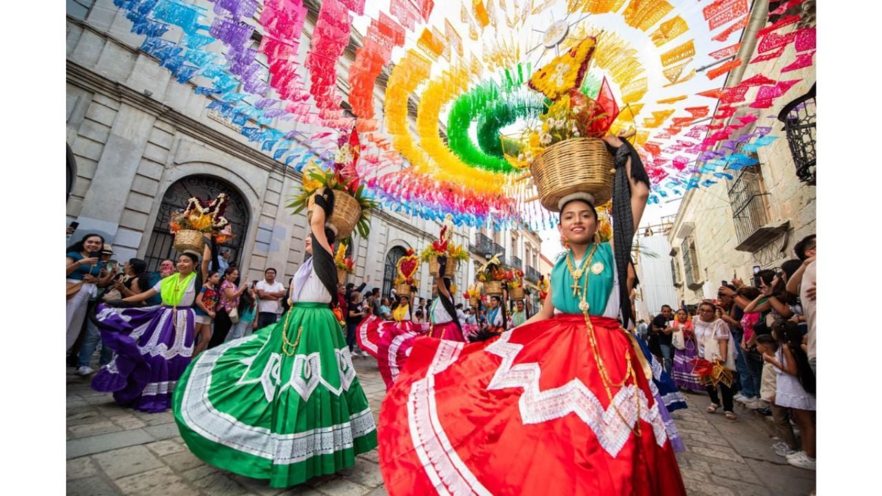 Performers in traditional Oaxacan dress at the Guelaguetza festival in Cancún