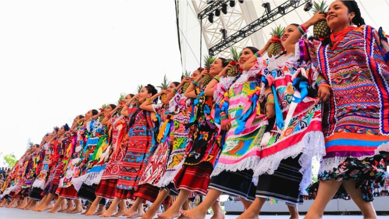 Performers in traditional Oaxacan dress at the Guelaguetza Riviera Maya festival in Playa del Carmen