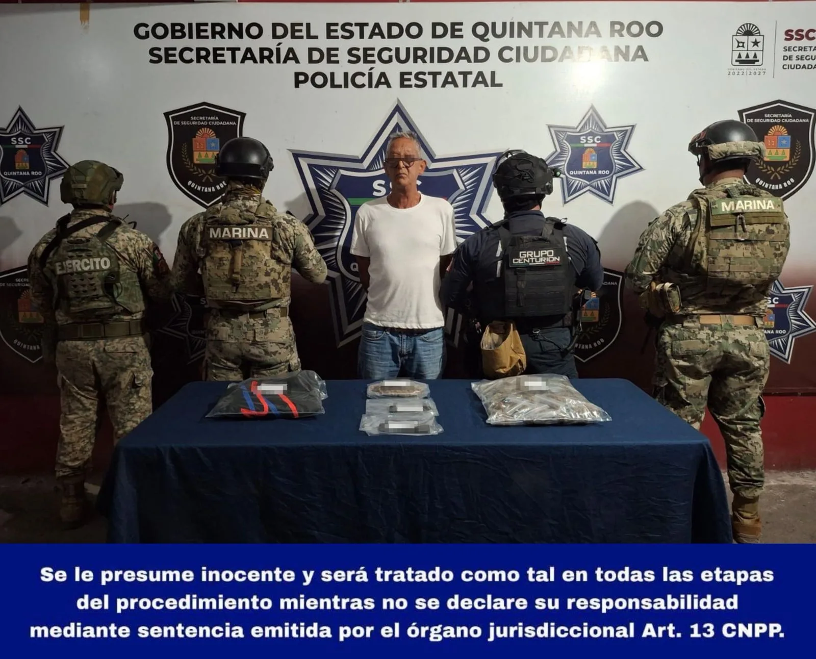 Police officers conducting an operation on a street in Holbox, Quintana Roo