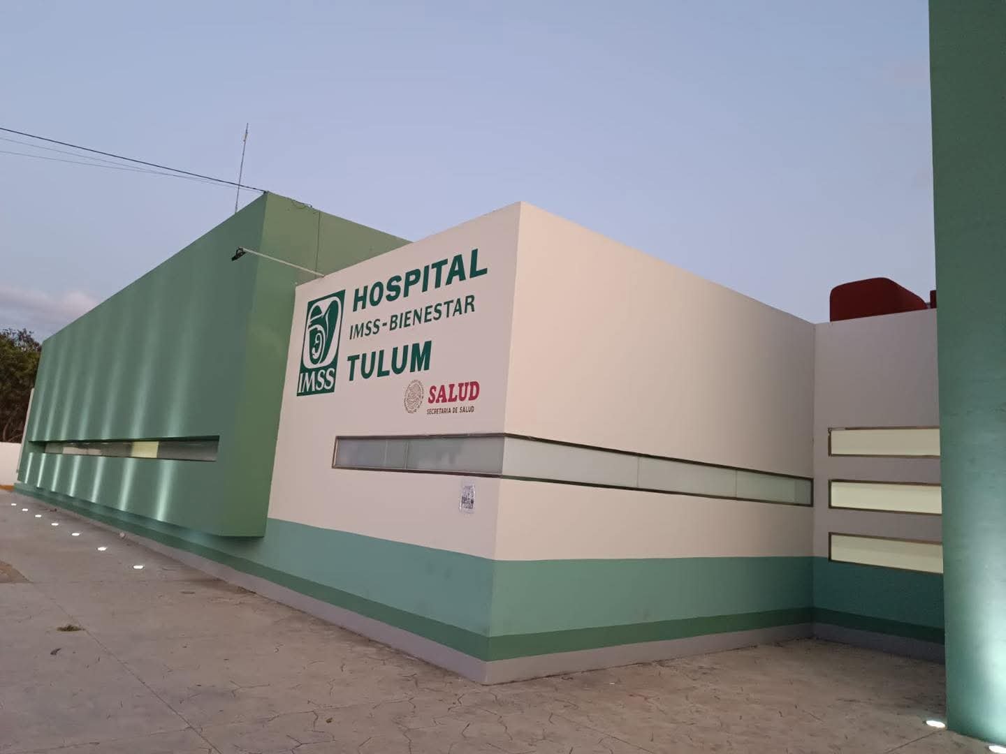 Exterior view of Hospital IMSS-Bienestar Tulum, showcasing its modern design and signage