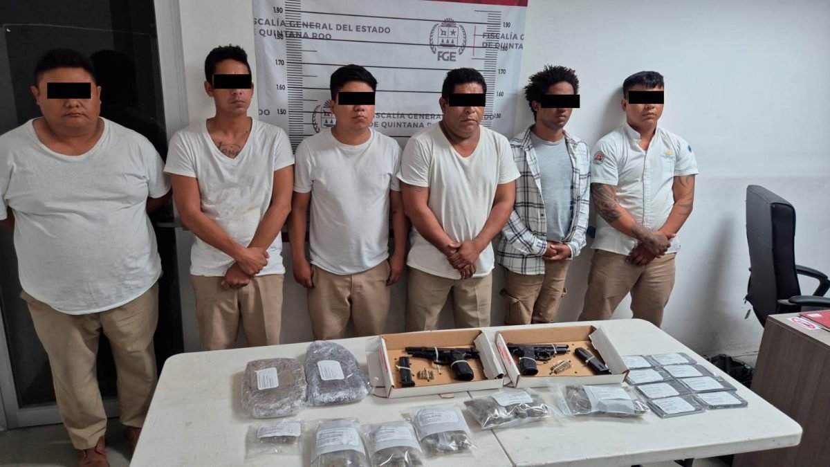 Police vehicles and seized items from a drug bust operation in Isla Mujeres, Quintana Roo