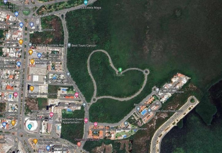 Aerial view of the Jacinto Pat Protected Area in Cancún, showing mangrove forests and urban surroundings