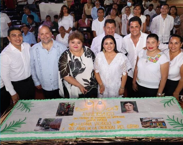 Officials and community members gather at a park in Leona Vicario, Quintana Roo, for a ceremony marking the 90th anniversary of the town's name change.