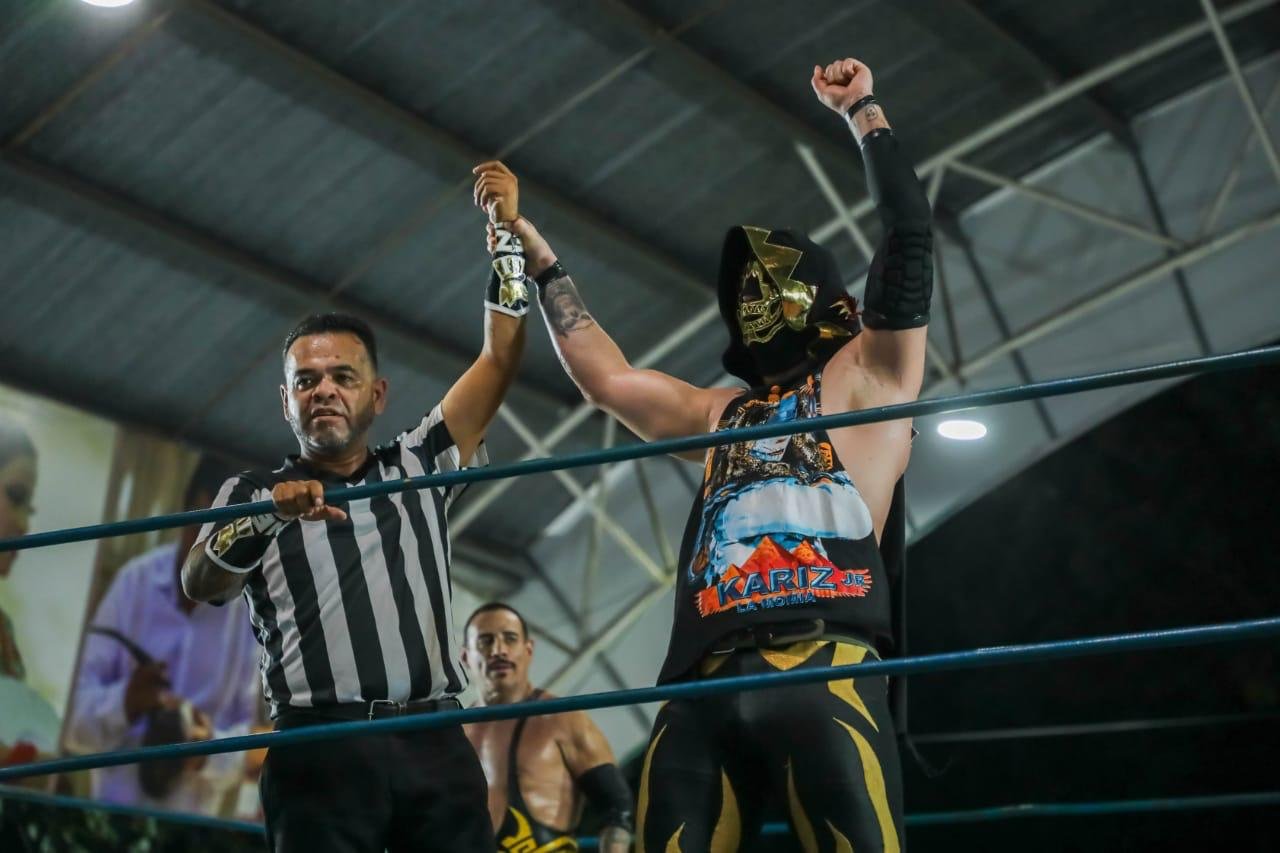 Lucha libre wrestlers performing in a ring in Tulum, Quintana Roo