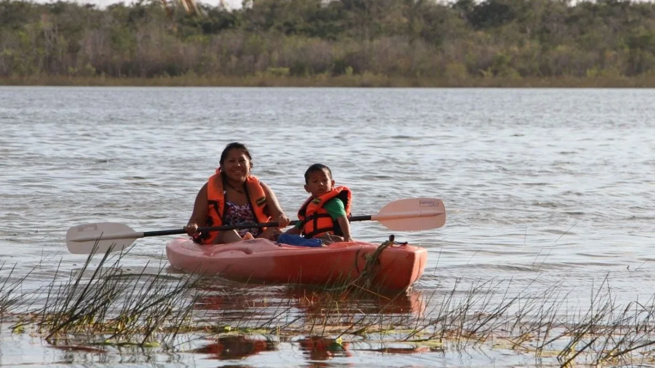 Business leaders and specialists gather at the Women's Forum in Cancun discussing Maya Kaan ecotourism development