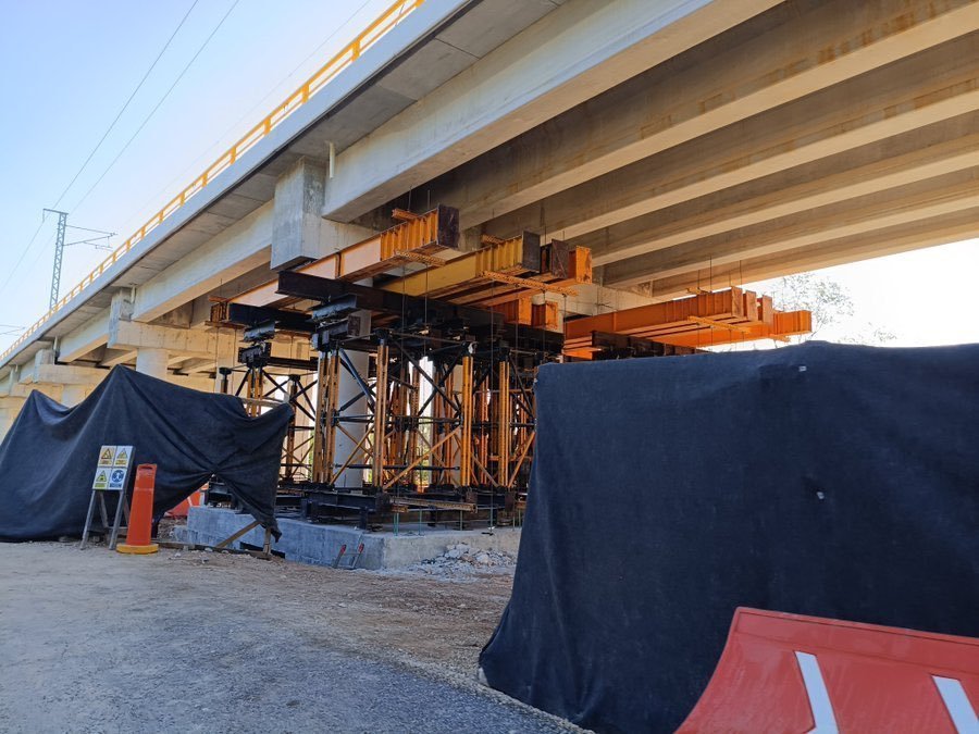 Aerial view showing sinkholes and temporary supports under the Maya Train viaduct near Xpu-Ha, Quintana Roo