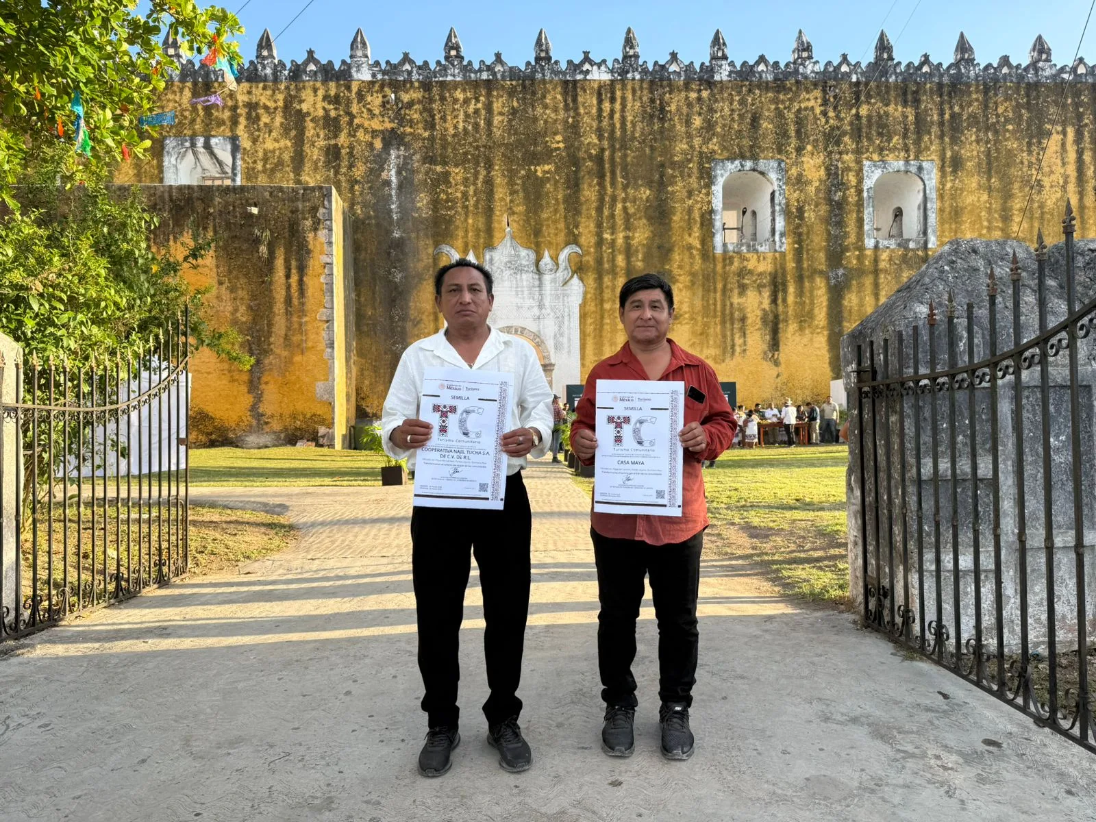 Officials present a community tourism award to representatives of Mayan cooperatives in Quintana Roo, Mexico.