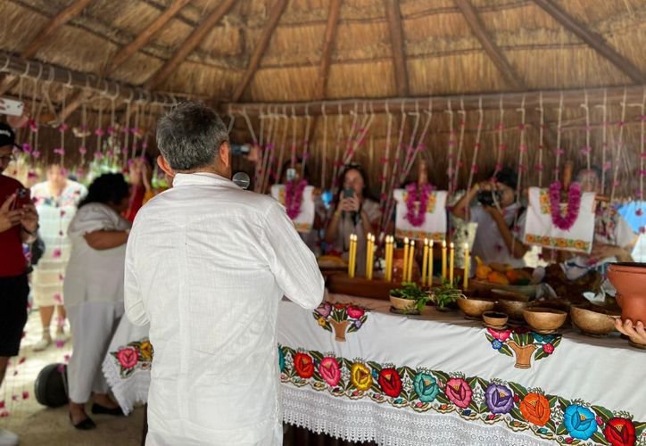 A Mayan woman in traditional dress, representing the exclusion of women from sacred rituals
