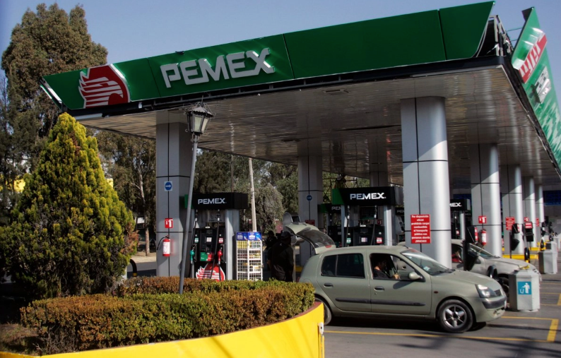 A gas station in Mexico showing fuel prices