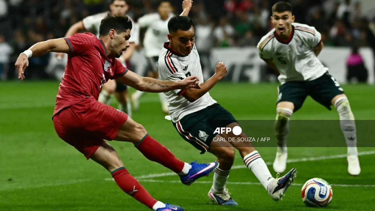 Players from Mexico and Portugal during the friendly match at the reopened Azteca Stadium