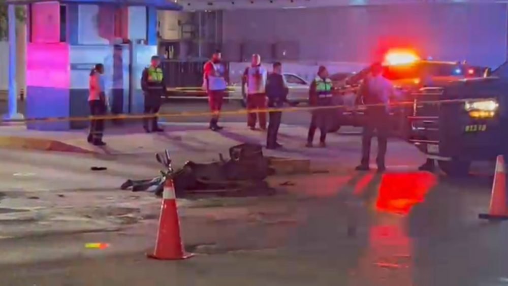 Emergency responders at the scene of a fatal motorcycle accident in Playa del Carmen